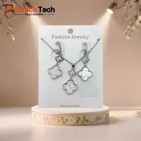 طقم إكسسوار — سلسلة وحلق بتصميم الزهرة الرباعية بخامة الصدف